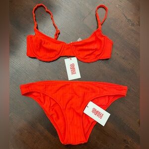 New with tags Solid and Striped red bikini cup with underwire small / medium